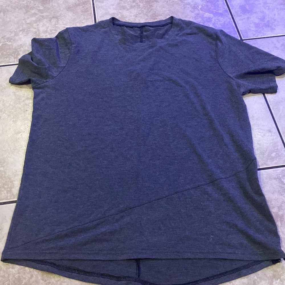 Dark grey tee shirt with side zipper.